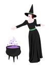 Beautiful witch prepares a potion in a cauldron Royalty Free Stock Photo